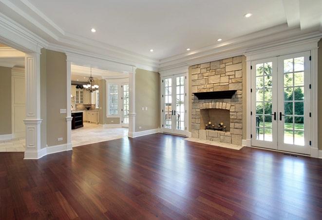 scuffed oak wood flooring in a living room