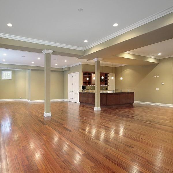 while it is possible, it's generally not recommended to install wood flooring in bathrooms or kitchens due to moisture